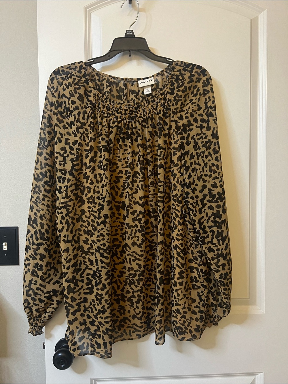 Sheer leopard print blouse with matching cami